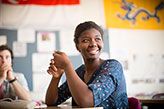 A photo of student smiling. Links to Gifts of Appreciated Securities