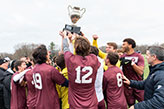 A soccer team cheering with a trophy. Links to Gifts That Pay You Income